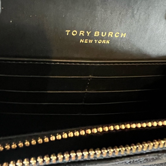 Tort Burch quilted black crossbody with gold detail. - Picture 8 of 9